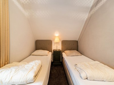 Holiday house Cosy holiday home with a private garden - Features photo 18