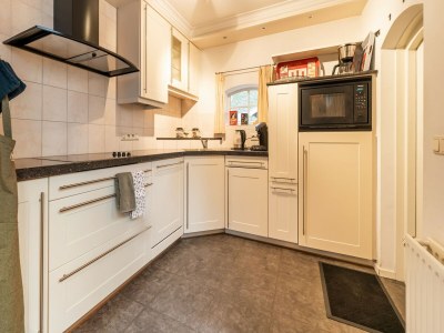 Holiday house Cosy holiday home with a private garden - Features photo 22