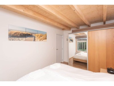 Holiday house Renesse Holiday Home w/ Fireplace - Features photo 8