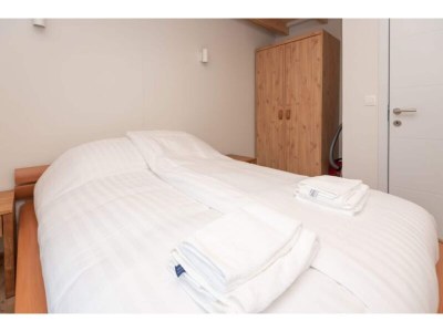 Holiday house Renesse Holiday Home w/ Fireplace - Features photo 14