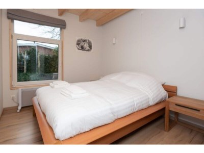 Holiday house Renesse Holiday Home w/ Fireplace - Features photo 21