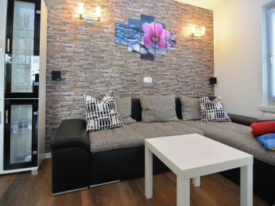 Holiday house Wellnesshaus mit Garten - Features photo 7