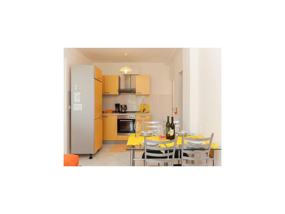 Apartment Apartments Pojko - One-Bedroom Apartment with Terrace (Yellow) - Features photo 4