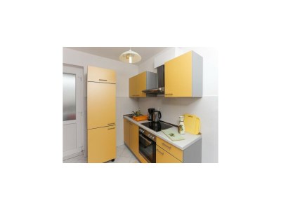 Apartment Apartments Pojko - One-Bedroom Apartment with Terrace (Yellow) - Features photo 10