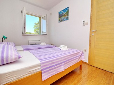 Apartment Apartments Gusti - Two-Bedroom Apartment with Balcony and Sea View - Features photo 9