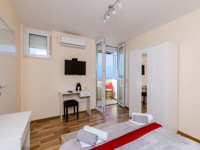 Apartment Apartment Vedrana- One-Bedroom Apartment with Balcony and Sea View - Features photo 11