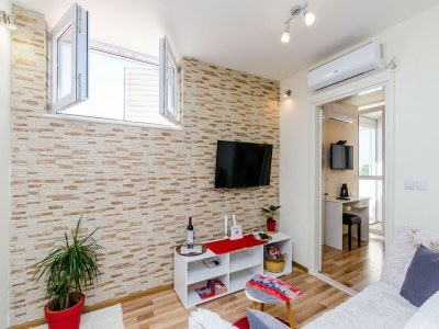 Apartment Apartment Vedrana- One-Bedroom Apartment with Balcony and Sea View - Features photo 23