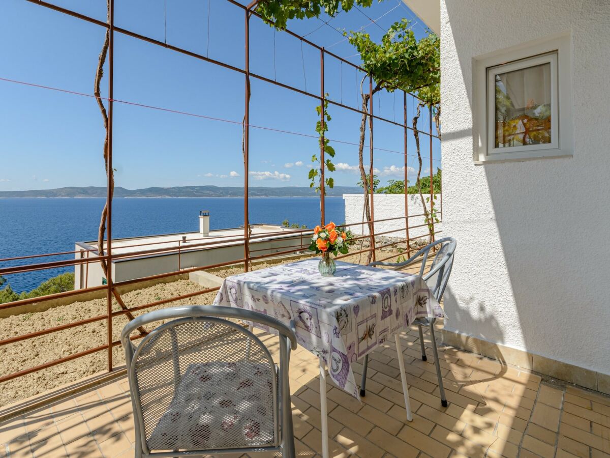Apartment Rooms Sani- Double Room with Terrace and Sea View (S2)