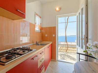 Apartment Rooms Sani- Double Room with Terrace and Sea View (S2) - Features photo 6