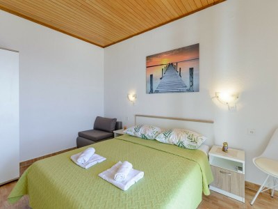 Apartment Rooms Sani- Double Room with Terrace and Sea View (S2) - Features photo 7