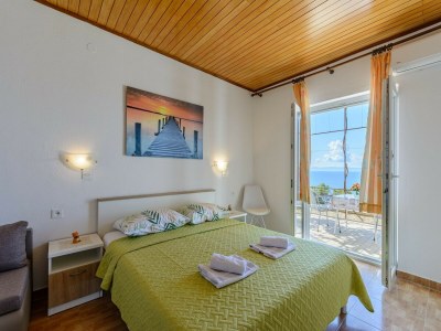 Apartment Rooms Sani- Double Room with Terrace and Sea View (S2) - Features photo 10