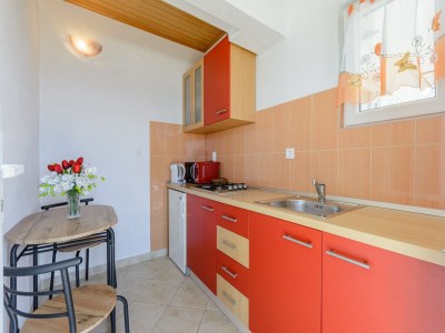 Apartment Rooms Sani- Double Room with Terrace and Sea View (S2) - Features photo 11