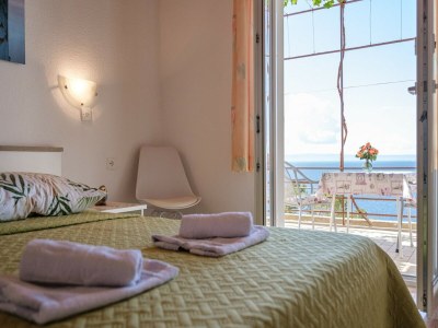 Apartment Rooms Sani- Double Room with Terrace and Sea View (S2) - Features photo 13