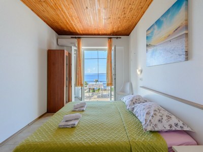 Apartment Rooms Sani - Double Room with Terrace and Sea View (S1) - Features photo 7