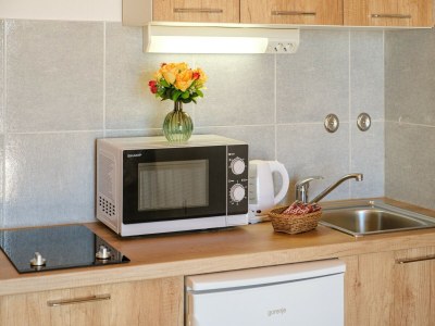 Apartment Rooms Sani - Double Room with Terrace and Sea View (S1) - Features photo 11