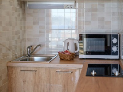 Apartment Rooms Sani - Double Room with Terrace and Sea View (S1) - Features photo 13