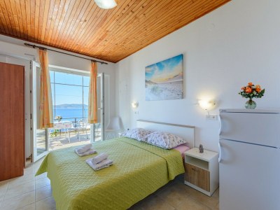 Apartment Rooms Sani - Double Room with Terrace and Sea View (S1) - Features photo 14