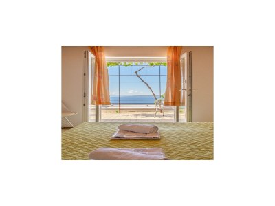 Apartment Rooms Sani - Double Room with Terrace and Sea View (S1) - Features photo 18