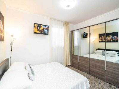 Apartment Apartments Blažević - Comfort Two Bedroom Apt with Hot Tub and Sea View - Features photo 9