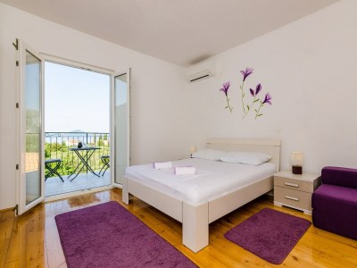 Apartment Apartment & Rooms Maždin - Triple Room with Balcony and Sea View ( Soba More ) - Features photo 16