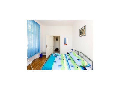 Apartment Apartment Blue & Green -  Two-Bedroom Apartment with Terrace and Garden View - Features photo 16