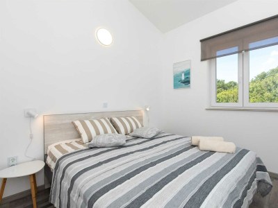 Holiday house Sandrina with a heated pool - Features photo 23