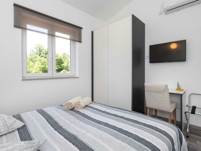 Holiday house Sandrina with a heated pool - Features photo 24