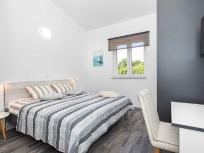 Holiday house Sandrina with a heated pool - Features photo 26