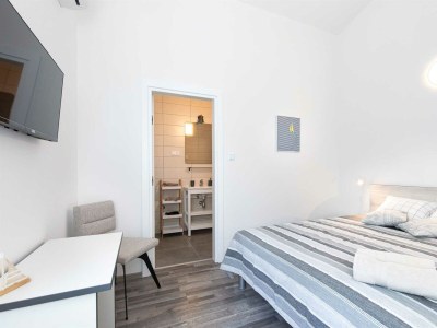 Holiday house Sandrina with a heated pool - Features photo 38