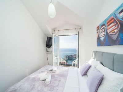 Apartment Apartments Isabora - Comfort Three-Bedroom Apartment with Balcony and Sea View (Second Floor) - Features photo 20