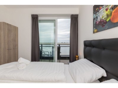 Apartment Apartment in Sint-Annaland with Water Views - Features photo 17