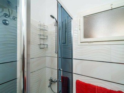 Apartment Apartments & Rooms Mara & Petrunjela - Studio Apartment with Balcony and Sea View - Features photo 23