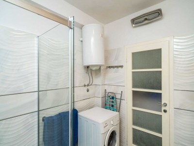 Apartment Apartments & Rooms Mara & Petrunjela - Two Bedroom Apartment with Terrace and Sea View - Features photo 27