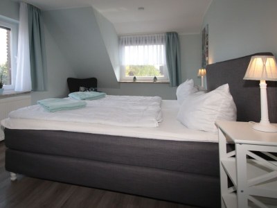 Apartment Ferienwohnung am Deich in Berumbur - Features photo 11