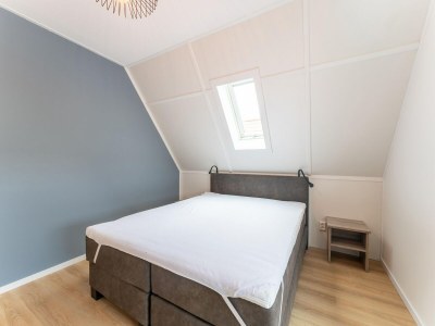 Holiday house Spacious holiday home with sauna - Features photo 12