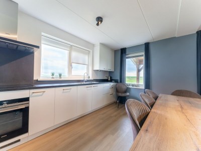 Holiday house Spacious holiday home with sauna - Features photo 19