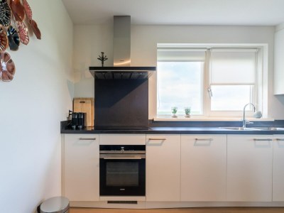 Holiday house Spacious holiday home with sauna - Features photo 20