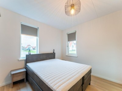 Holiday house Spacious holiday home with sauna - Features photo 23