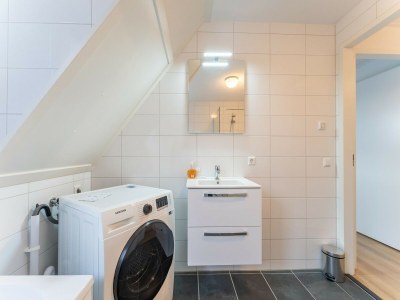 Holiday house Spacious holiday home with sauna - Features photo 29