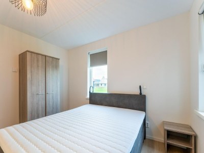 Holiday house Spacious holiday home with sauna - Features photo 30