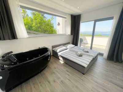 Holiday house Holiday home with bubble bath , sauna and sea view - Features photo 7