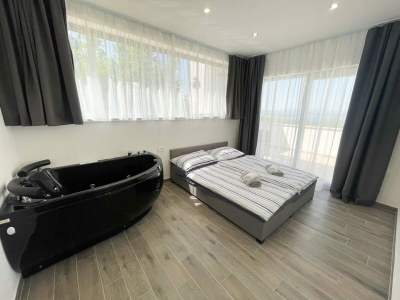 Holiday house Holiday home with bubble bath , sauna and sea view - Features photo 9
