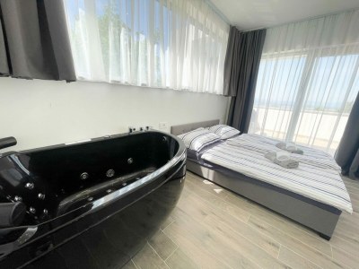 Holiday house Holiday home with bubble bath , sauna and sea view - Features photo 10