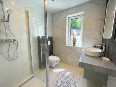 Holiday house Holiday home with bubble bath , sauna and sea view - Features photo 11