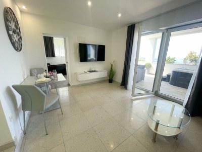 Holiday house Holiday home with bubble bath , sauna and sea view - Features photo 14