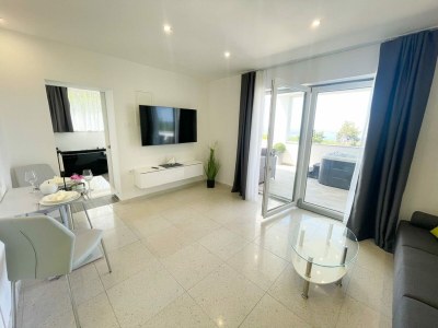 Holiday house Holiday home with bubble bath , sauna and sea view - Features photo 16