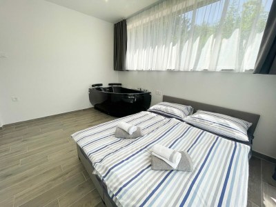 Holiday house Holiday home with bubble bath , sauna and sea view - Features photo 20