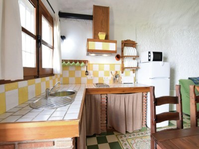 Holiday park Höhlenhaus in Guadix mit Pool und Grill - Features photo 18