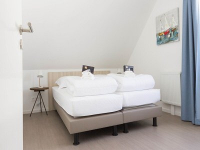 Holiday park Large Holiday Home by Coast - Features photo 13