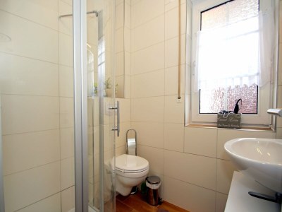 Apartment Ferienwohnung mit Sonnenterrasse in Dornumersiel - Features photo 6